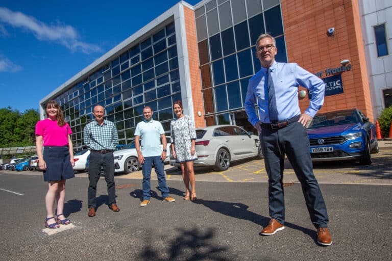 Baltic's management team outside the new HQ