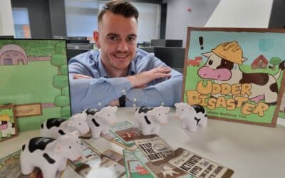 Craig Archdeacon with the board game version of Udder Disaster