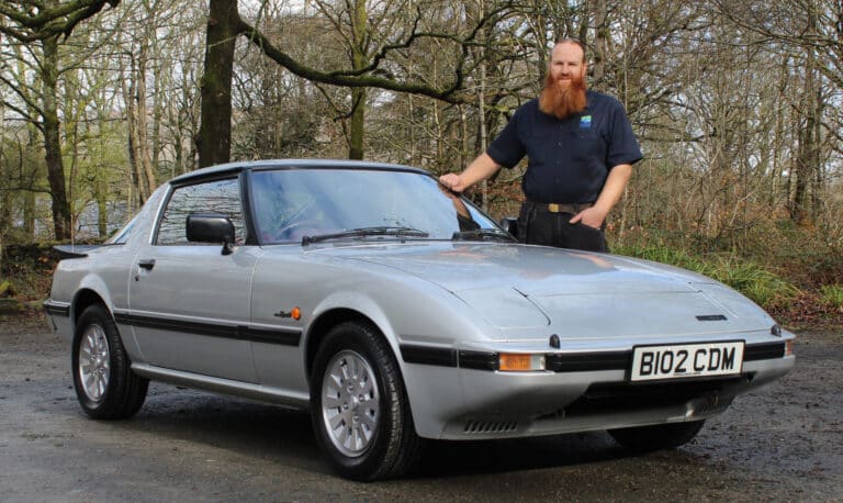 Chris Lowe, curator at the Lakeland Motor Museum, with the Mazda RX7
